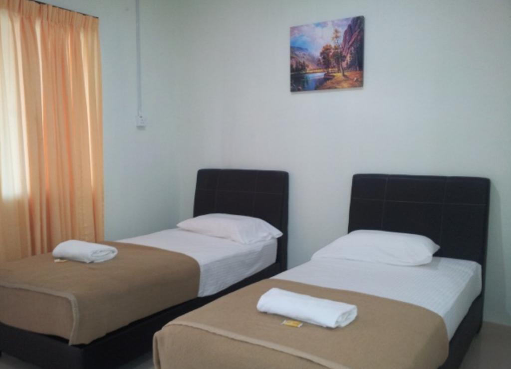 Huda Inn Пантай Ченанг Стая снимка